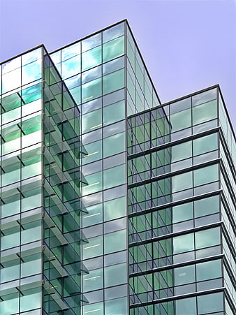 Modern Glass Office Building Facade with Geometric Design