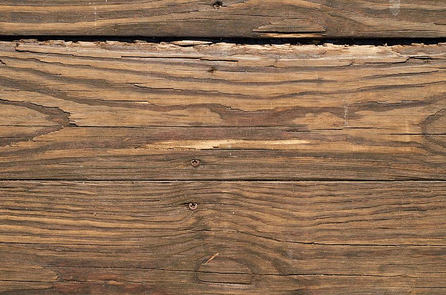 Weathered wooden planks with rustic texture and grain