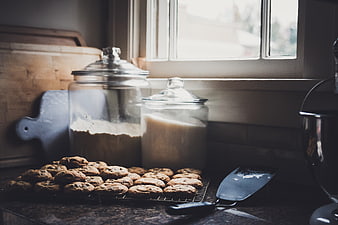 Homemade chocolate chip cookies cooling on kitchen counter