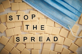 Stop the Spread Scrabble Tiles and Blue Surgical Mask