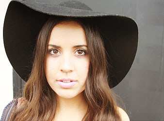 Portrait of Woman in Black Cowboy Hat