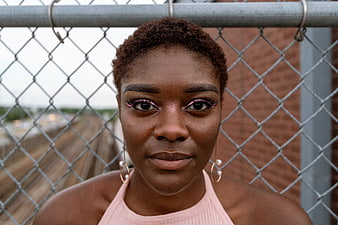 Portrait of Black Woman with Pink Eyeliner and Short Hair