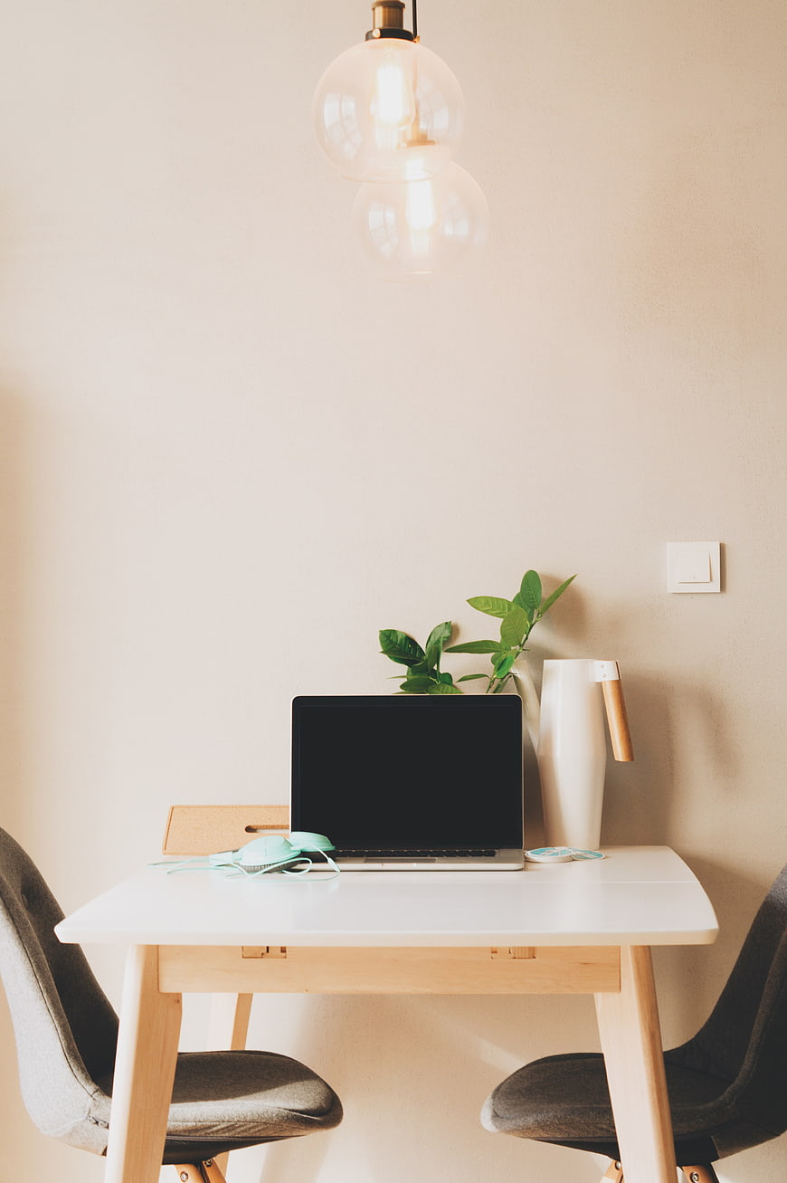 Minimalist Home Office Desk with Laptop and Pendant Light