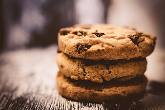 Stack of Chocolate Chip Cookies on Rustic Wood