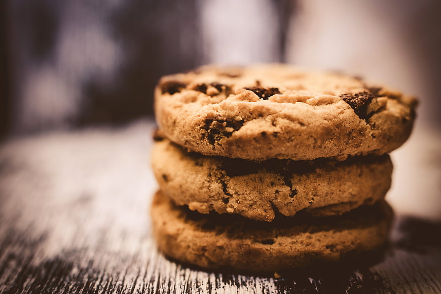 Stack of Chocolate Chip Cookies on Rustic Wood