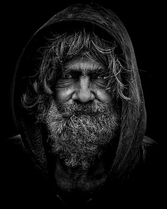 Intense Black and White Portrait of Hooded Bearded Man