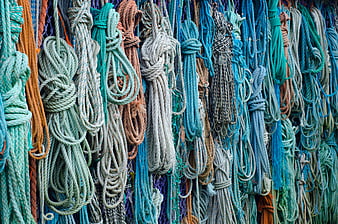 Colorful Hanging Ropes and Knots Texture Background