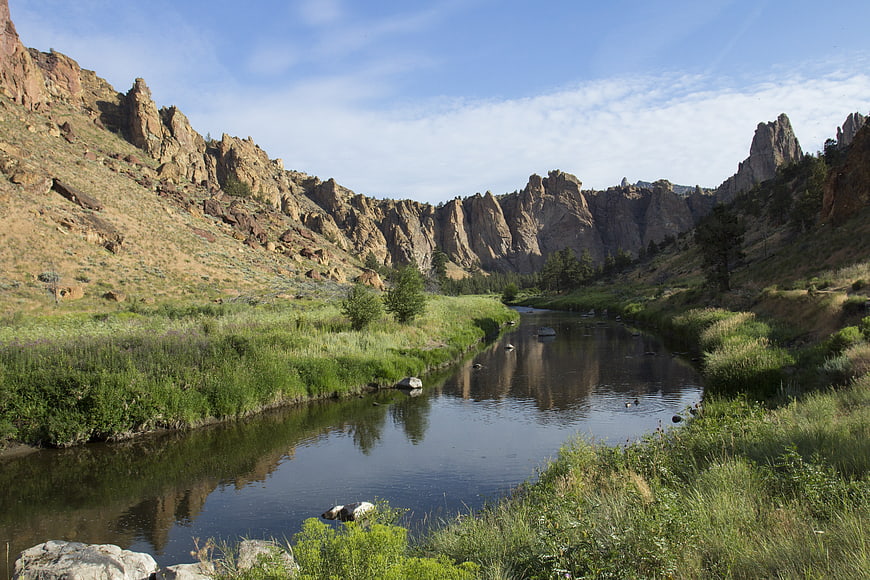 Scenic river winding through rocky mountain canyon landscape