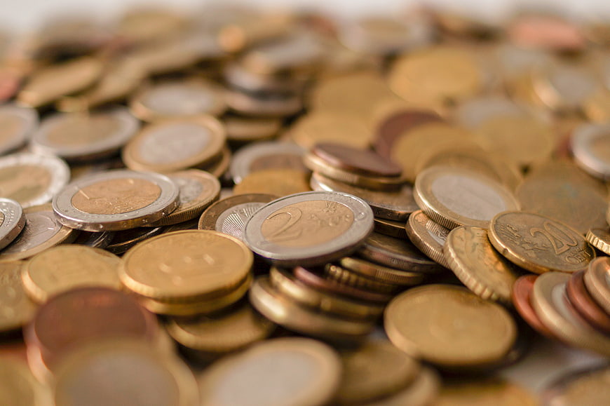 Close-up of mixed Euro coins pile for finance concept
