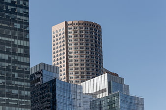Modern Glass Skyscrapers and Office Buildings Against Blue Sky