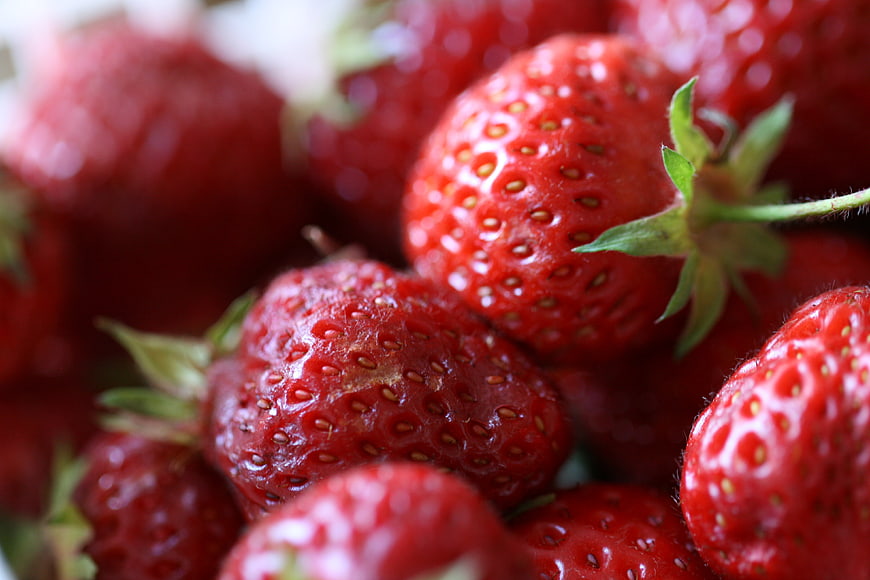 Close-up of fresh ripe red strawberries with seeds