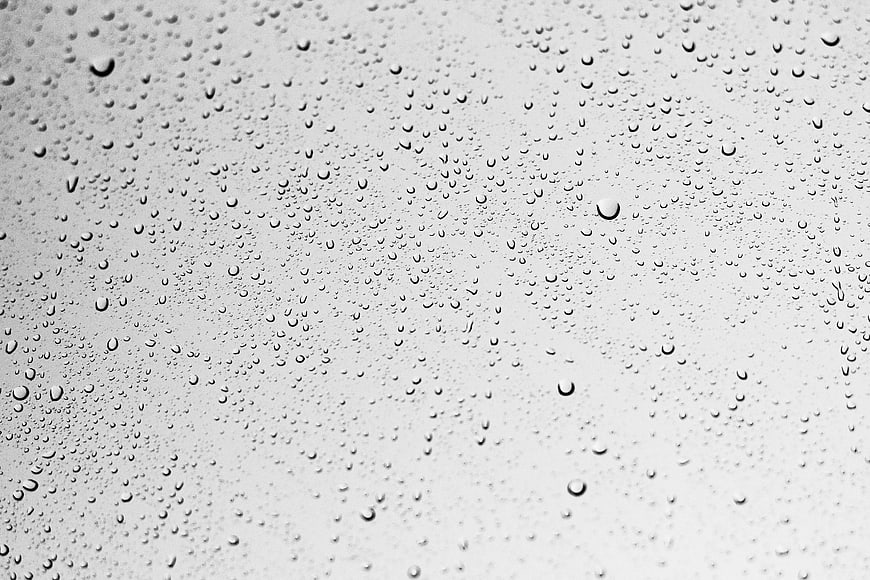 Black and White Raindrops on Glass Texture Background