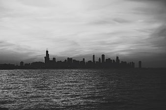 Moody Black and White Chicago Skyline Silhouette Over Lake