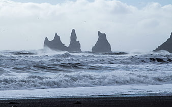 Dramatic Sea Stacks on Black Sand Beach with Rough Waves