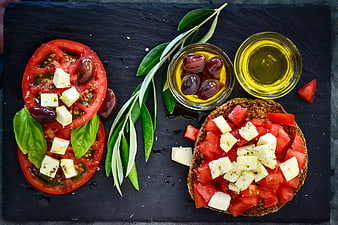 Top View of Dakos with Tomatoes, Feta, and Olive Oil