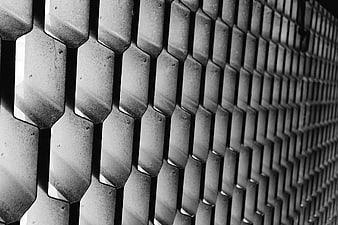 Black and white hexagonal metal mesh texture pattern