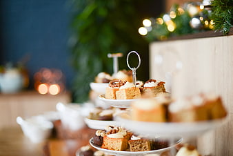 Tiered Stand of Mini Cakes with Christmas Decorations