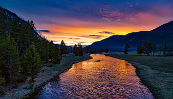 Golden Sunset Reflection on Mountain River