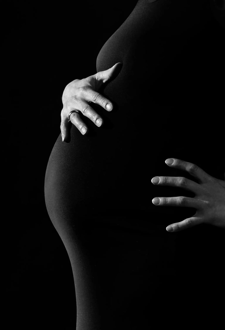 Black and White Pregnant Woman Belly Close Up