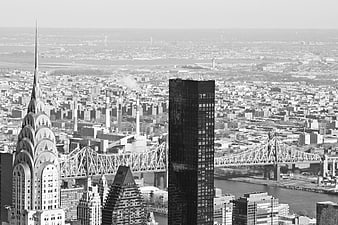 Black and white aerial view of New York City skyline with Chrysler Building