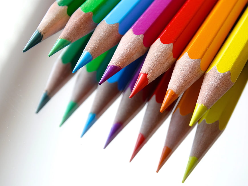Close-up of colorful pencils on white background