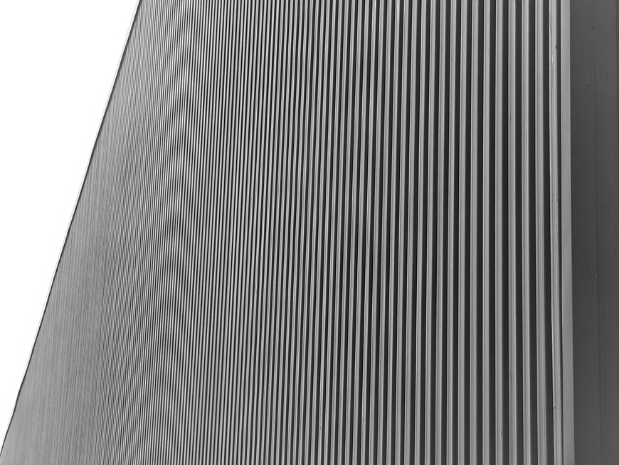 Abstract Black and White Corrugated Metal Wall Texture
