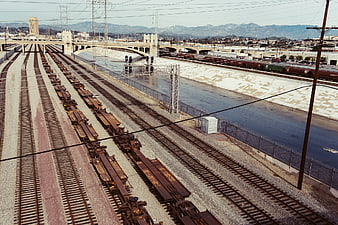 Aerial view of Los Angeles rail yard and concrete river channel