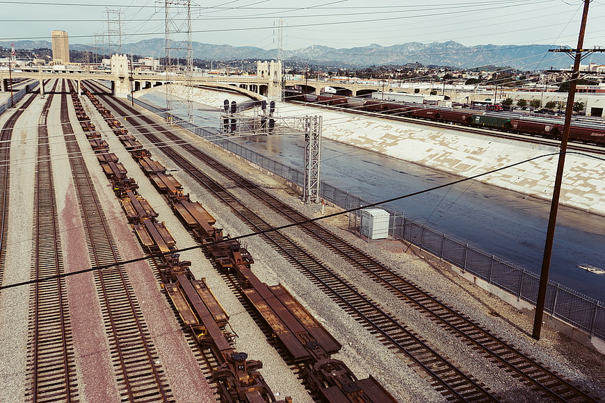 Aerial view of Los Angeles rail yard and concrete river channel