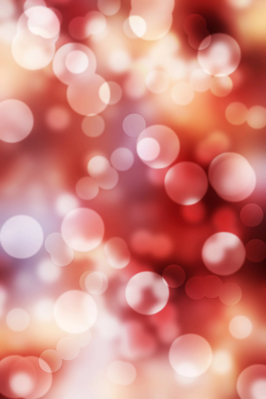 Abstract Red and Pink Bokeh Background with Soft Light Circles