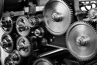 Close-up of interlocking metal gears in industrial machinery