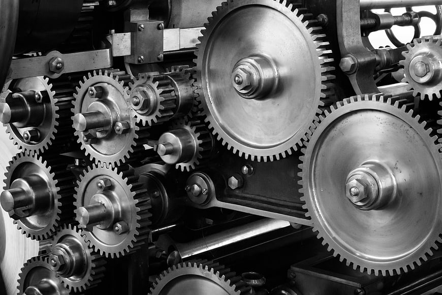 Close-up of interlocking metal gears in industrial machinery