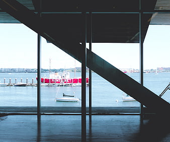 Modern interior view of harbor through glass windows