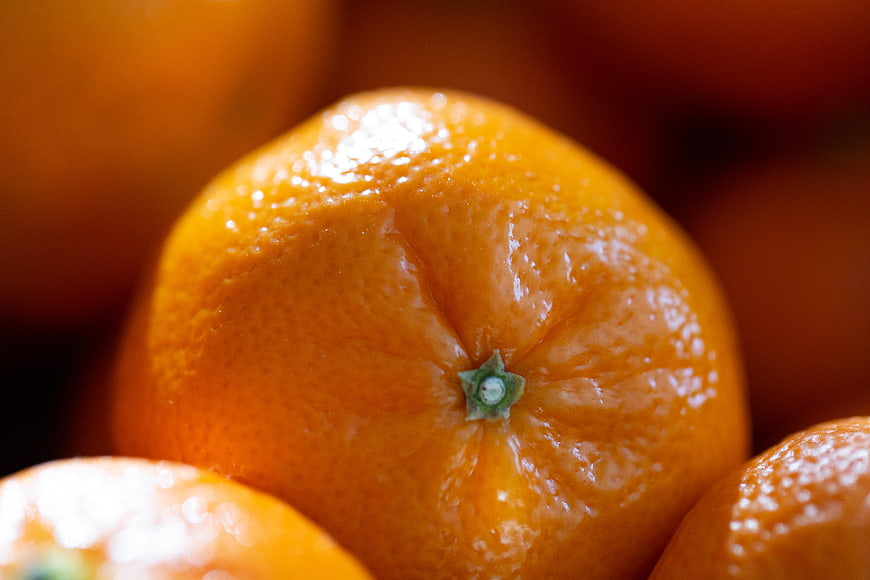Close-up of Fresh Orange Fruit with Water Droplets