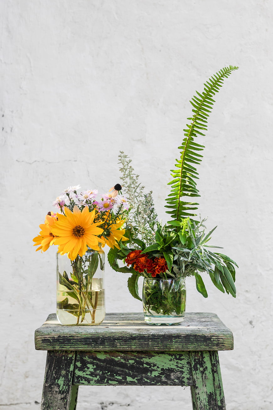 Rustic Wildflower Arrangement on Weathered Green Wooden Stool