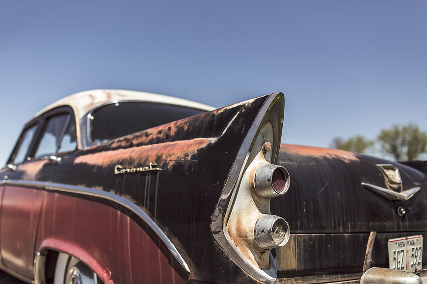 Rusty vintage Chrysler Coronet tail fin detail