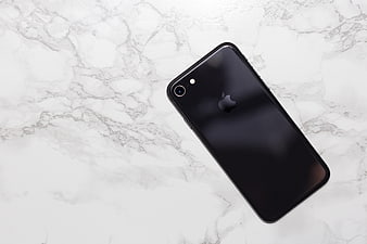 Black Smartphone on White Marble Background