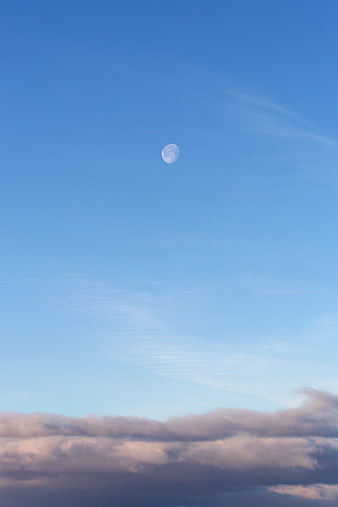Full Moon in Blue Sky with Pink Clouds