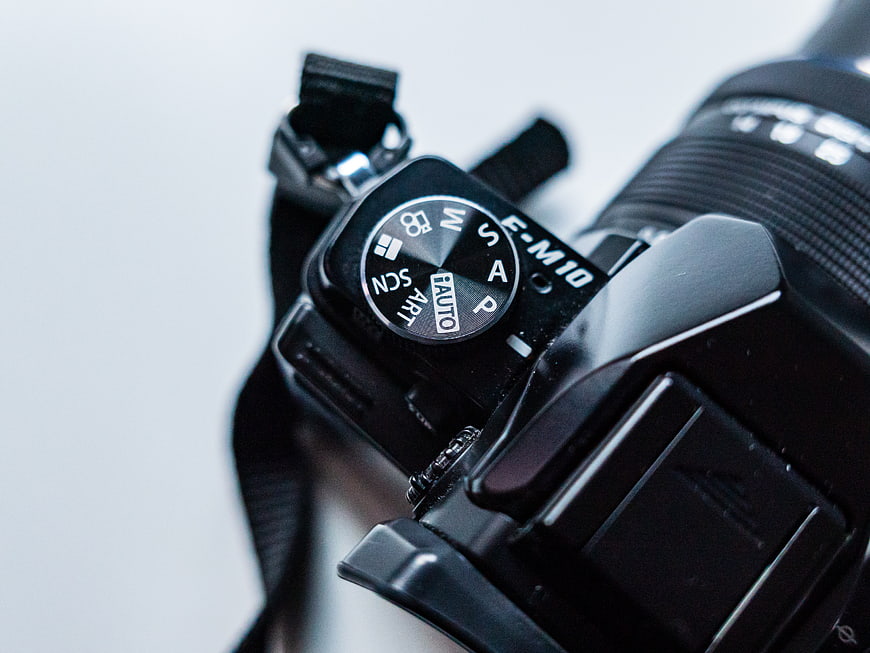 Close-up of Fujifilm Camera Mode Dial and Lens