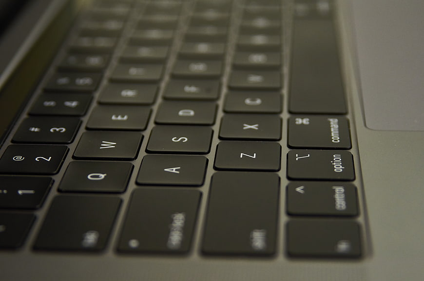 Close-up of laptop keyboard keys with shallow depth of field