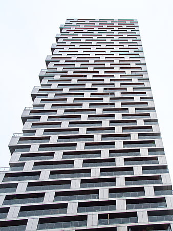 Low angle view of modern high-rise apartment building facade