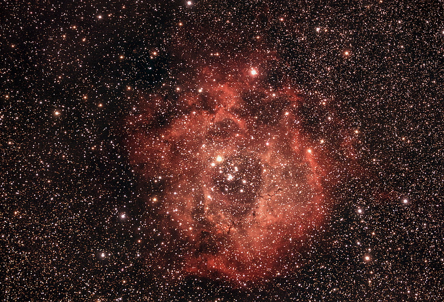 Stunning Red Nebula and Star Cluster in Deep Space