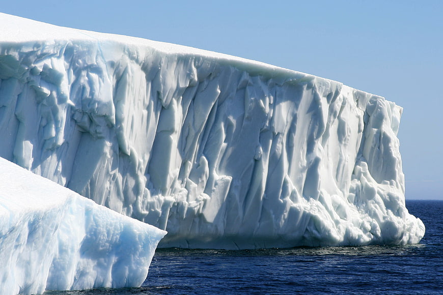 Massive Tabular Iceberg Floating in Arctic Ocean