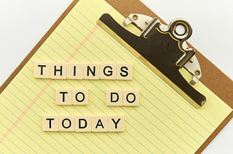 Things to do today letters on yellow clipboard