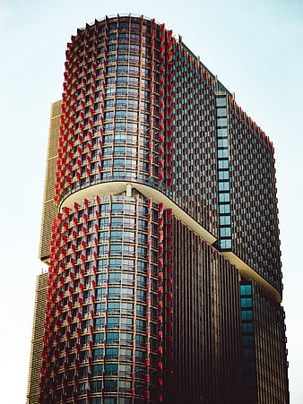 Modern Skyscraper with Red and Blue Facade Details