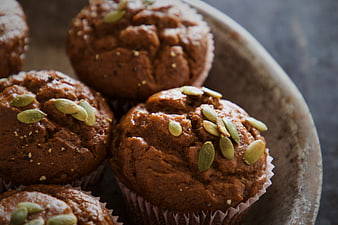 Close-up of homemade pumpkin muffins with seeds