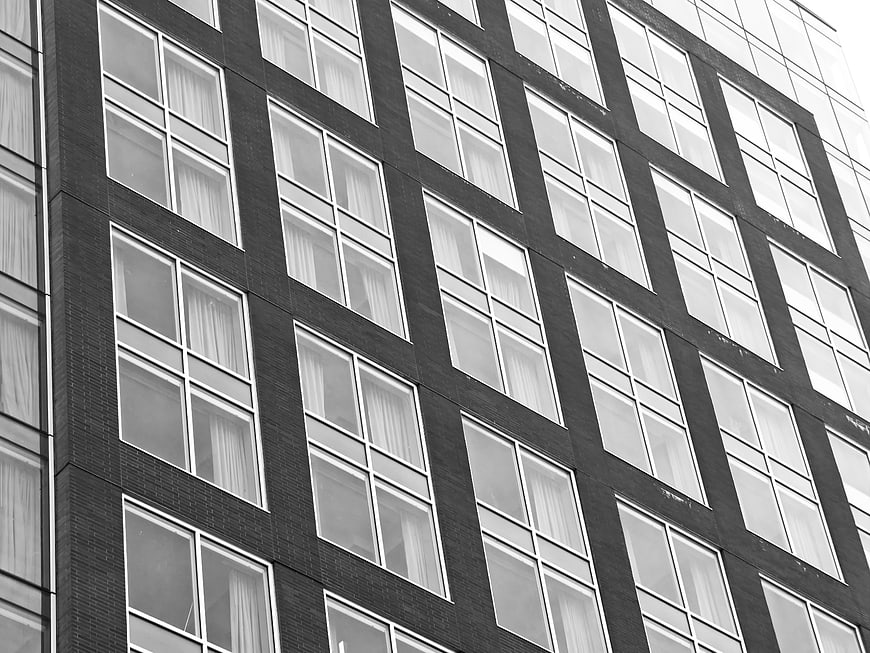 Black and White Modern Office Building Facade with Windows