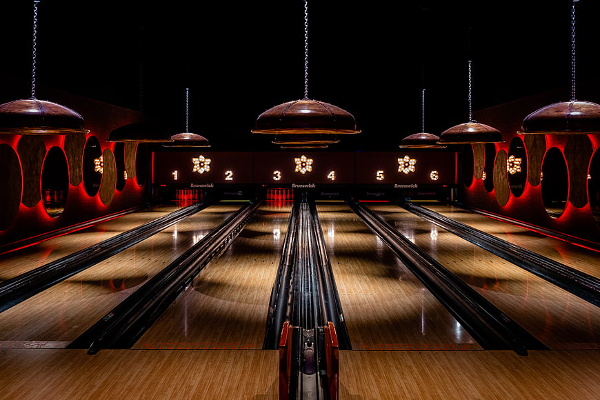 Empty Vintage Bowling Alley with Retro Lanes and Neon Lights