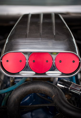 Close-up of vintage muscle car engine air intake