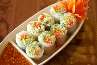 Vietnamese Spring Rolls with Dipping Sauce on White Plate