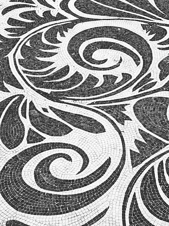 Black and white mosaic floor pattern with swirls